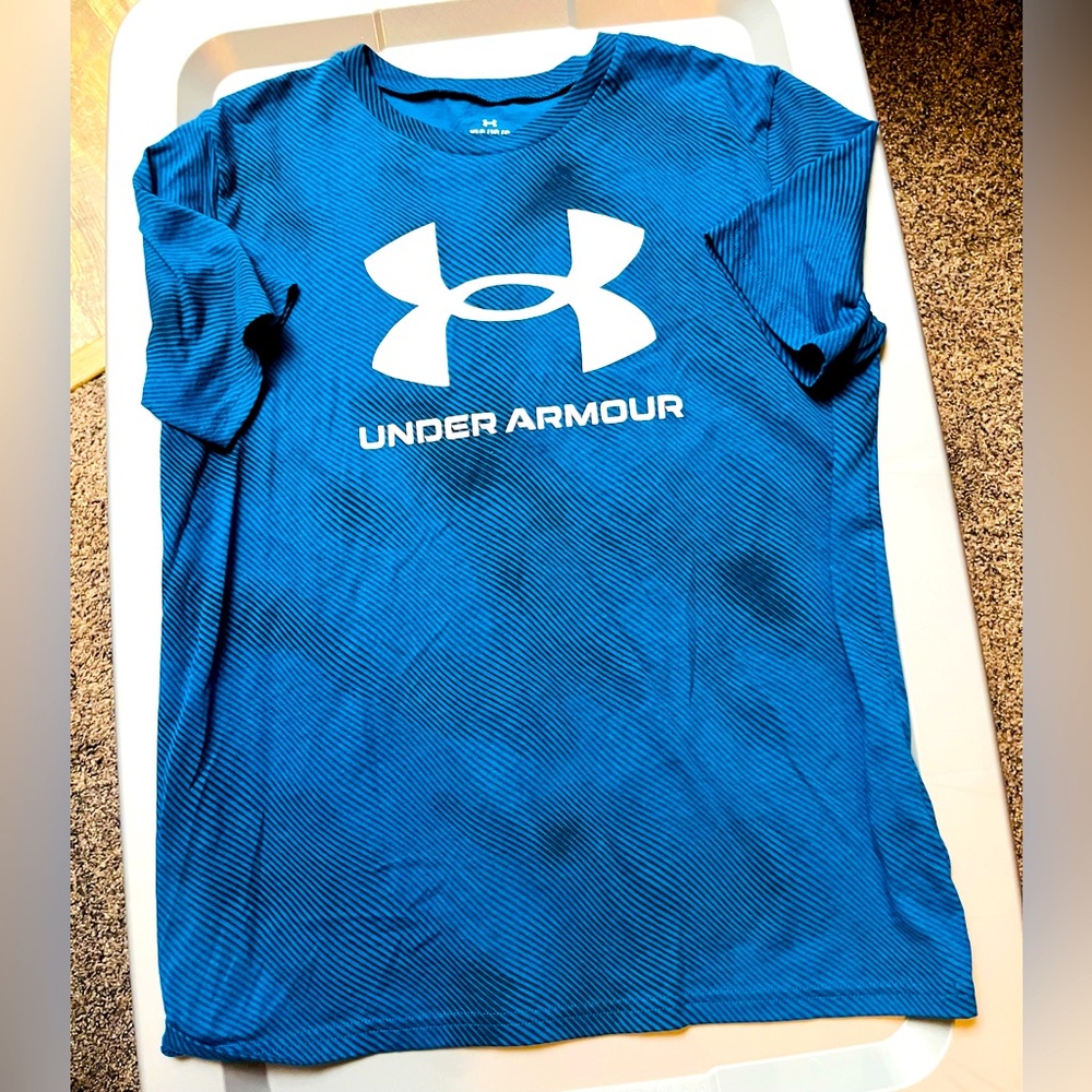 Under Armour boys size large blue dry-fit short sleeve shirt.